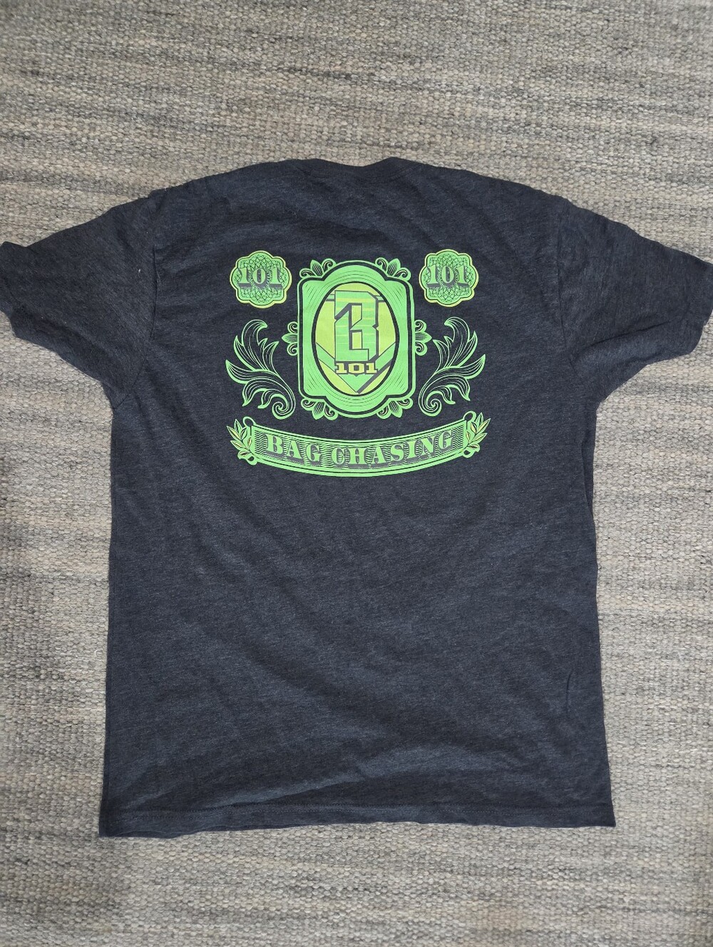 Baseball Lifestyle 101 Bag Chasing Graphic T-Shirt - Navy with Green Print